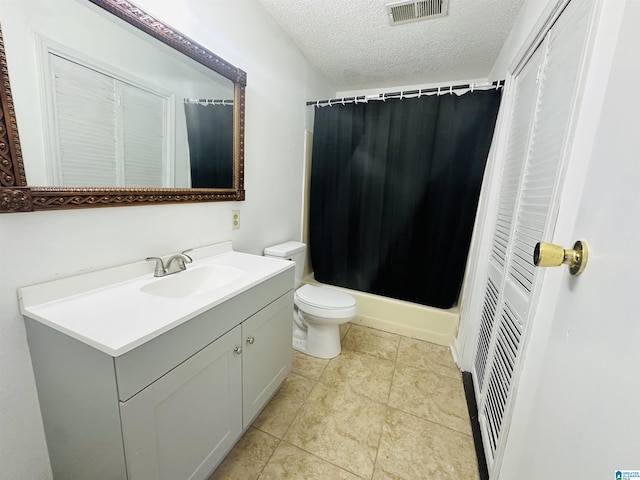 bathroom featuring visible vents, toilet, a textured ceiling, vanity, and a shower with curtain