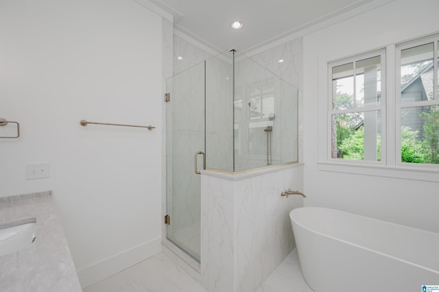 212 Olmsted St, Birmingham, AL 35242 - bathroom featuring marble look tile flooring, a marble finish shower, a freestanding bath, baseboards, and recessed lighting