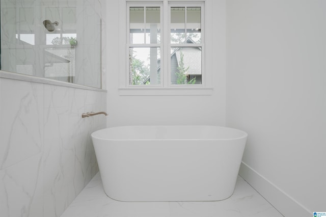 212 Olmsted St, Birmingham, AL 35242 - full bath featuring marble finish flooring, a marble finish shower, a freestanding bath, and baseboards