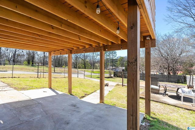 view of patio with fence