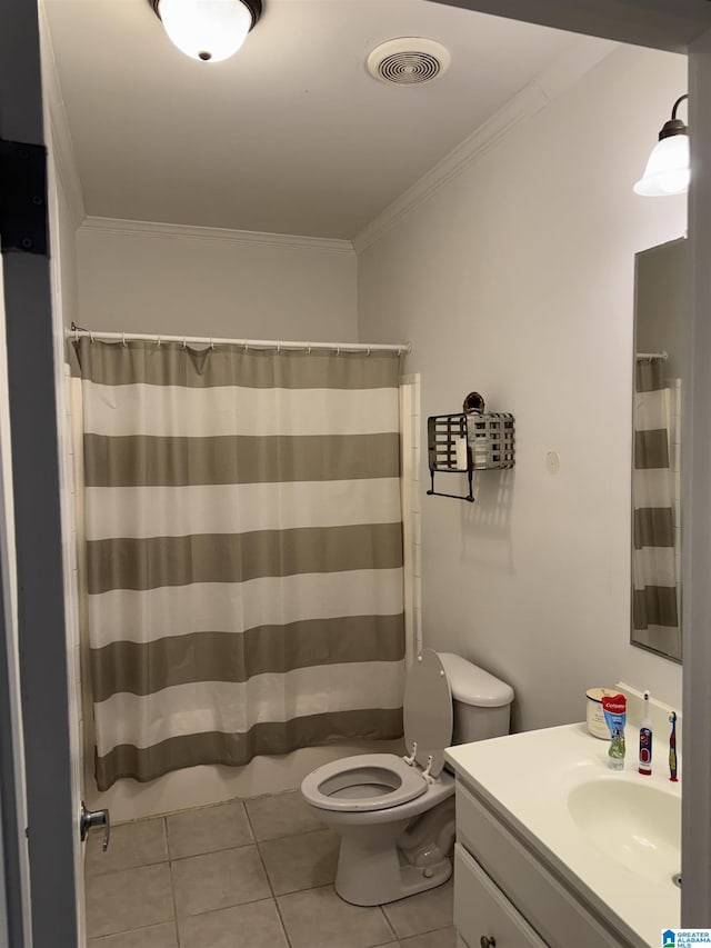 bathroom featuring visible vents, toilet, ornamental molding, vanity, and tile patterned floors