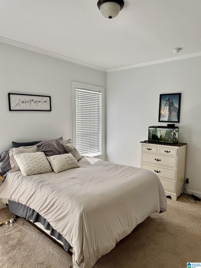 carpeted bedroom featuring crown molding