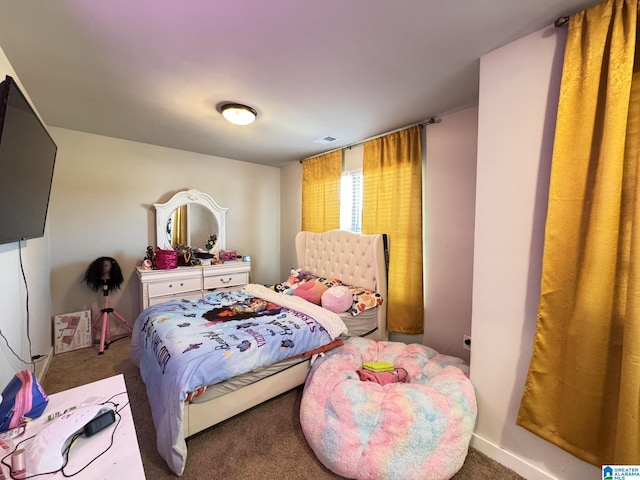 bedroom featuring carpet and visible vents