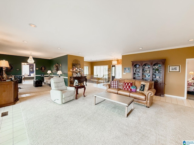 living area with tile patterned flooring, crown molding, baseboards, and recessed lighting