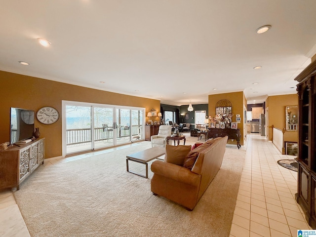 living area featuring light tile patterned floors, ornamental molding, and recessed lighting