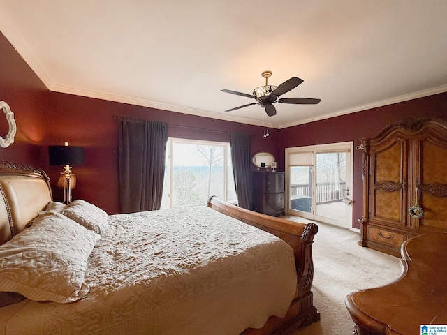 carpeted bedroom featuring access to exterior, ceiling fan, and ornamental molding