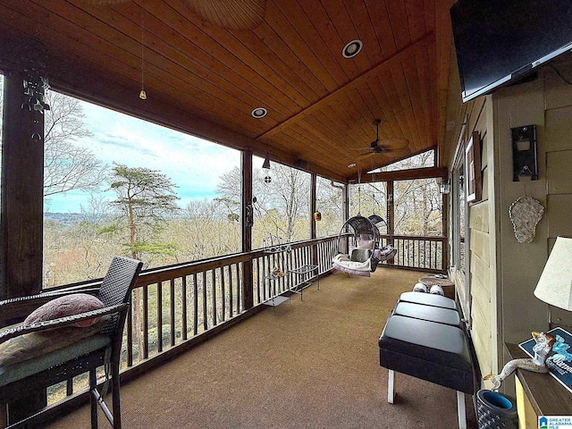 exterior space featuring lofted ceiling and wooden ceiling