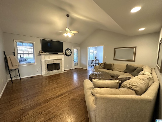 13733 Ginger Dr, Mccalla, AL 35111 - living room with lofted ceiling, dark wood-style floors, a ceiling fan, and a wealth of natural light
