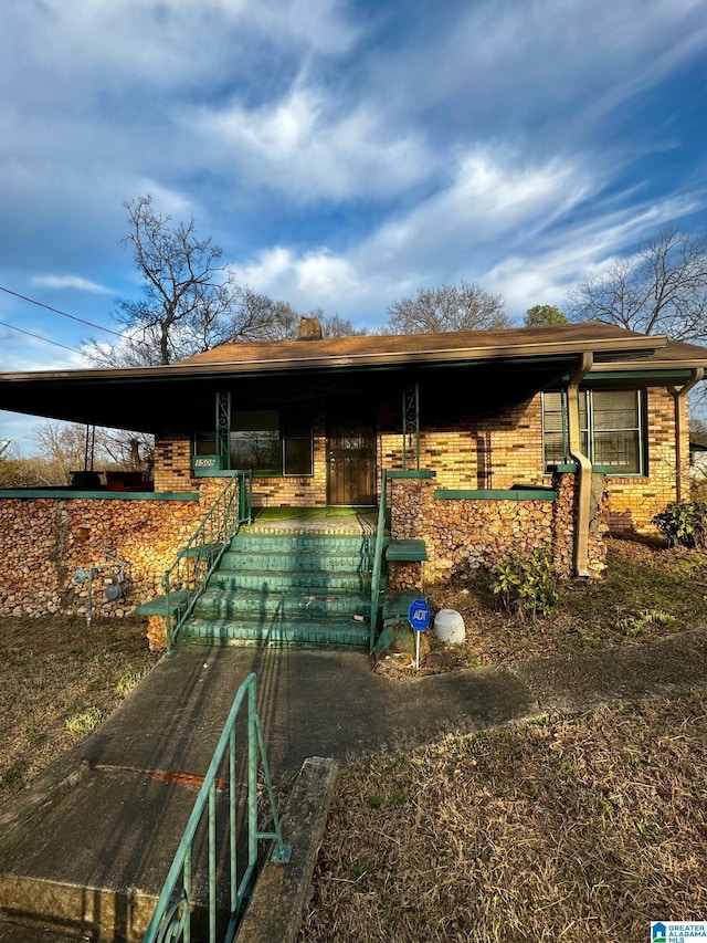 view of front of property with brick siding