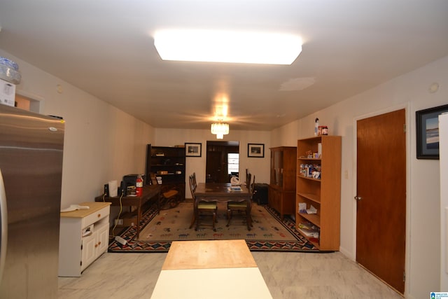 dining area with marble finish floor