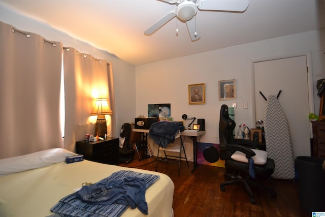 bedroom with ceiling fan and wood finished floors