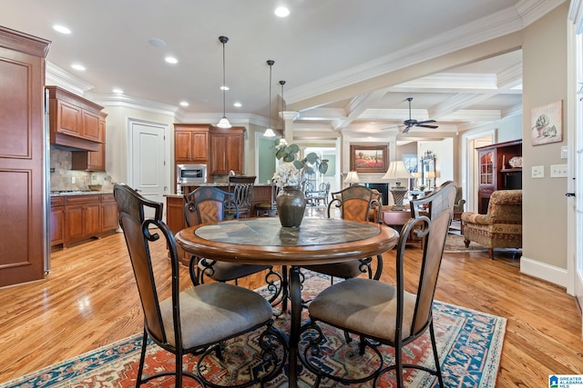 dining space featuring recessed lighting, a ceiling fan, ornamental molding, light wood-type flooring, and beamed ceiling