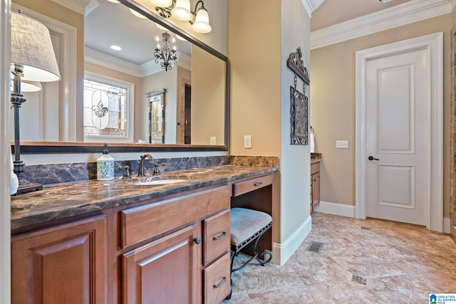 bathroom featuring ornamental molding, visible vents, vanity, and baseboards