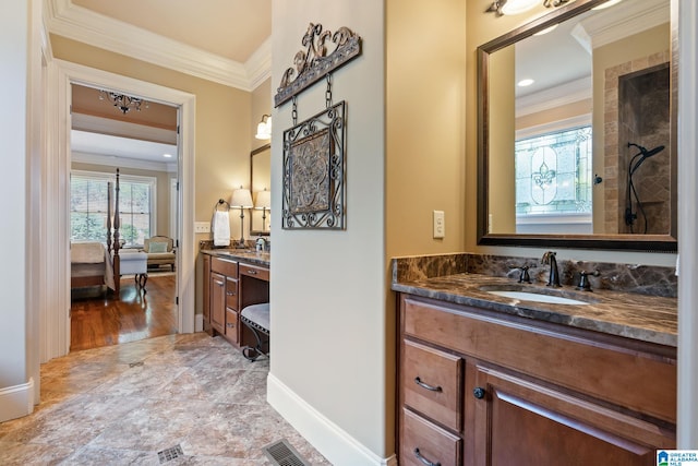 ensuite bathroom featuring visible vents, ensuite bath, ornamental molding, a sink, and two vanities