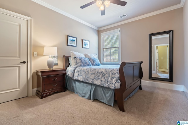 bedroom with baseboards, visible vents, ornamental molding, and light colored carpet