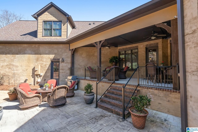 view of patio / terrace with a ceiling fan and grilling area