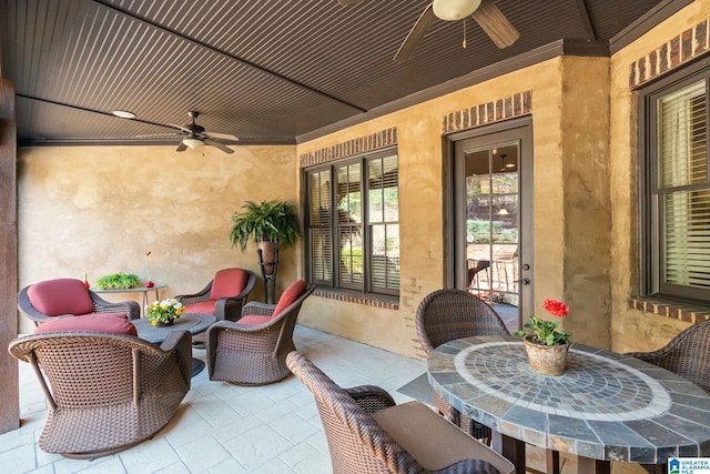 view of patio / terrace featuring a ceiling fan