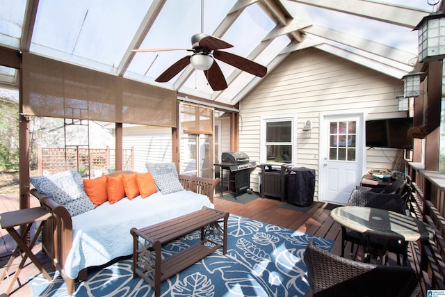 sunroom / solarium with vaulted ceiling and ceiling fan