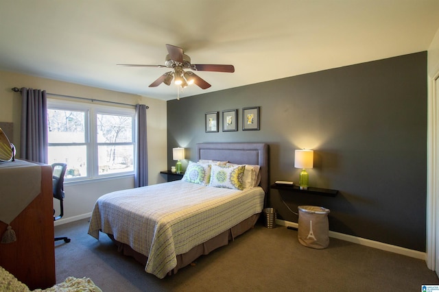 carpeted bedroom featuring a ceiling fan and baseboards