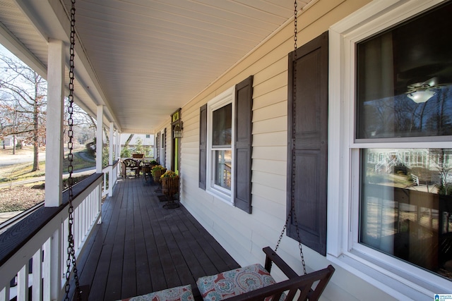 wooden deck featuring covered porch