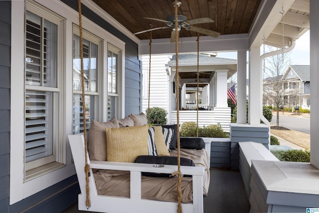 view of patio with a porch and a ceiling fan