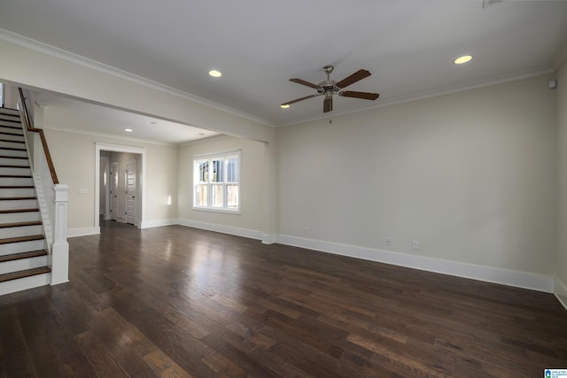 spare room featuring baseboards, ornamental molding, dark wood-type flooring, stairs, and recessed lighting