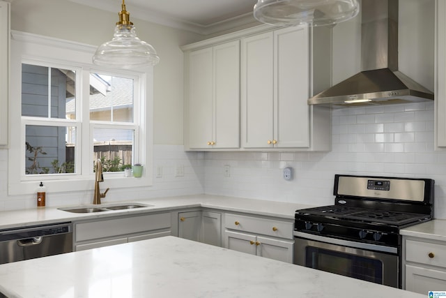 kitchen with stainless steel appliances, a sink, ornamental molding, backsplash, and wall chimney exhaust hood