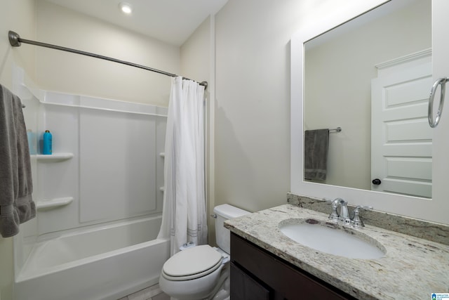 full bathroom featuring toilet, shower / tub combo, and vanity