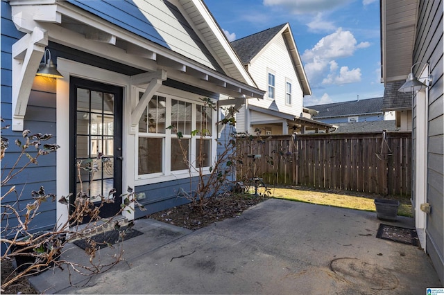 view of patio featuring fence