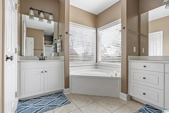 bathroom with a garden tub, a shower, tile patterned flooring, and vanity