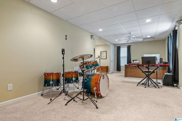 playroom featuring recessed lighting, a ceiling fan, carpet flooring, a drop ceiling, and baseboards