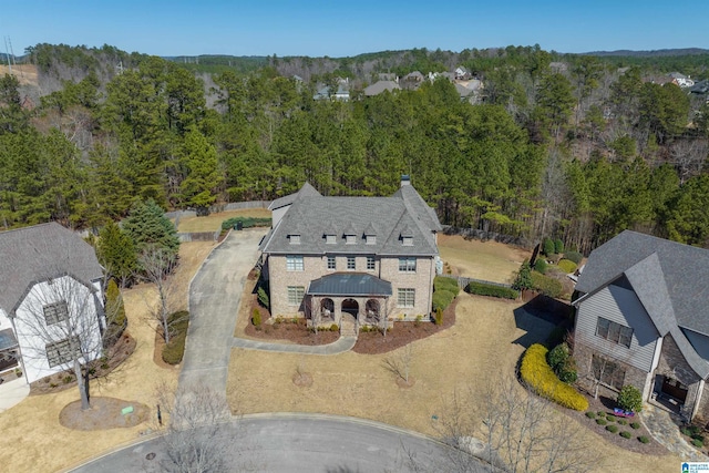 aerial view featuring a view of trees