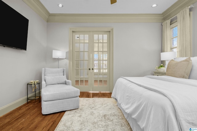 bedroom featuring french doors, recessed lighting, ornamental molding, wood finished floors, and baseboards