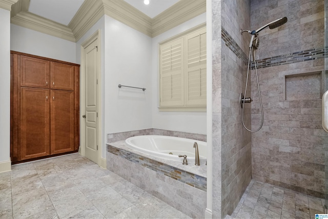 bathroom featuring a garden tub, crown molding, and tiled shower