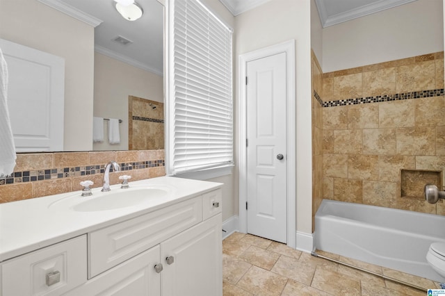 bathroom featuring ornamental molding, shower / bath combination, vanity, and visible vents