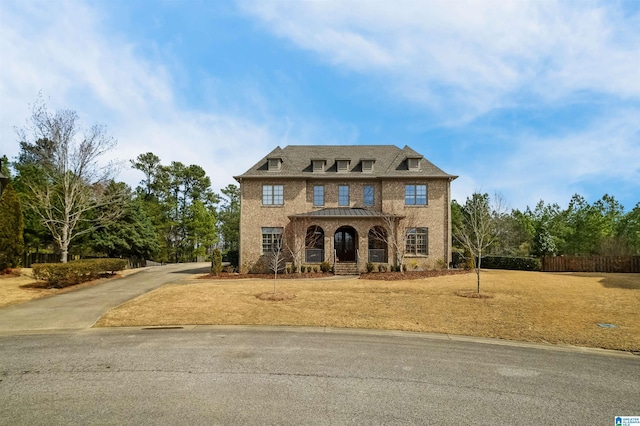 view of front of house with fence