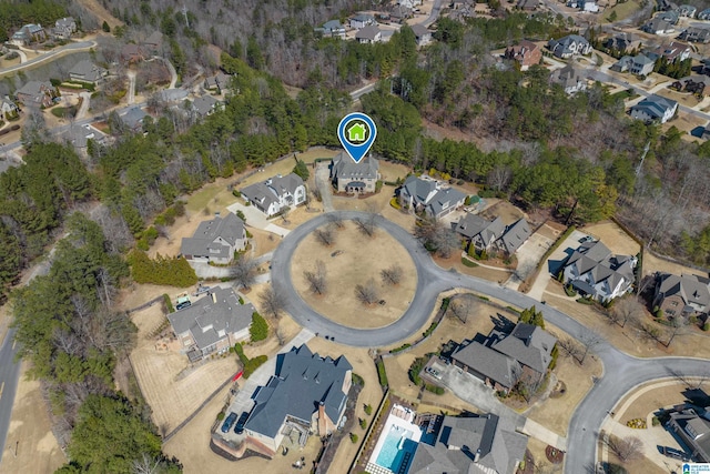 birds eye view of property with a residential view