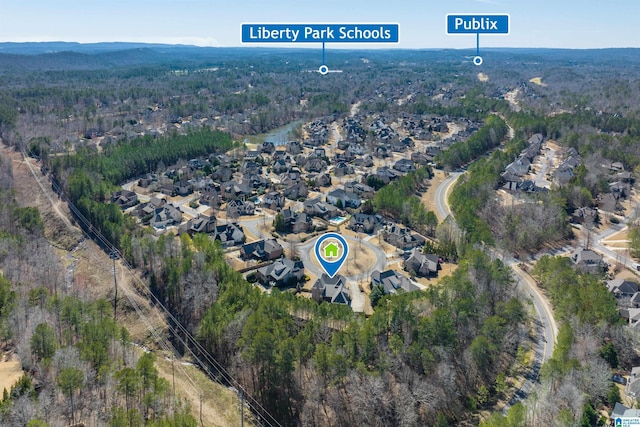 aerial view featuring a forest view