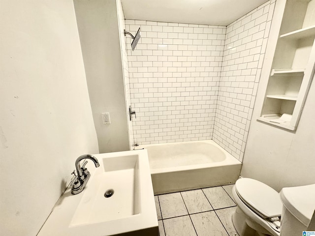 full bathroom featuring shower / washtub combination, a sink, and toilet