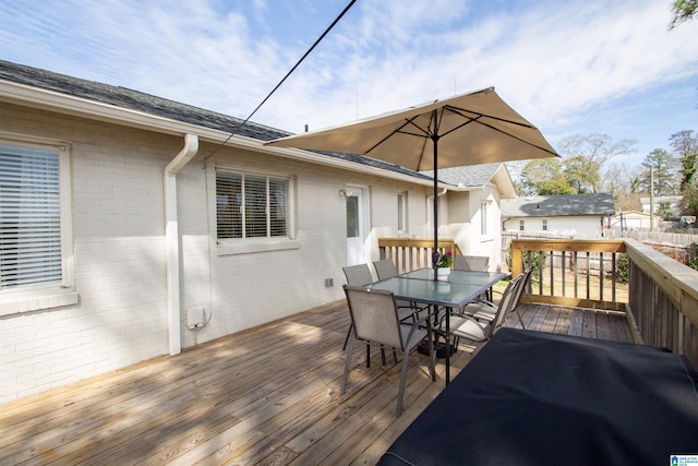 deck with outdoor dining space