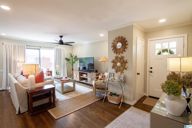 living room with baseboards, ornamental molding, wood finished floors, and recessed lighting