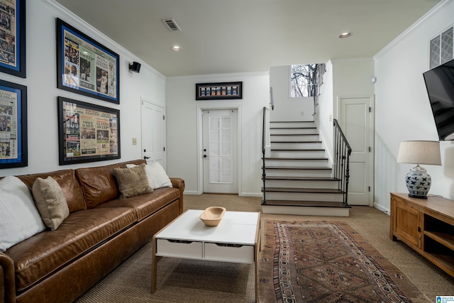 living room with visible vents, ornamental molding, stairway, carpet flooring, and baseboards