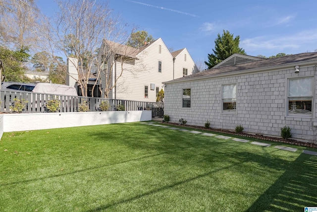 view of yard featuring fence