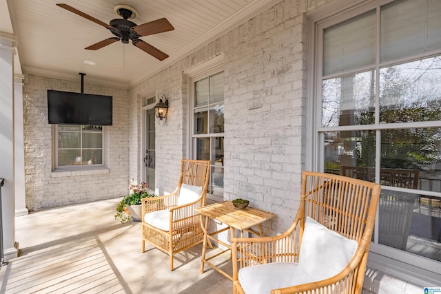 view of patio with a porch and a ceiling fan