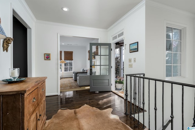 entryway featuring wood finished floors, baseboards, recessed lighting, ceiling fan, and ornamental molding