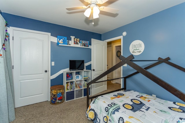 carpeted bedroom featuring a ceiling fan