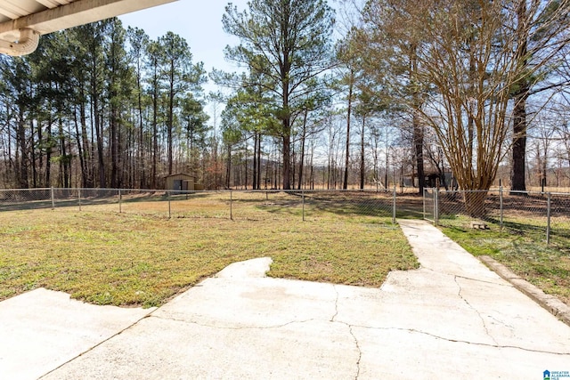 view of yard featuring fence private yard, a gate, and a patio