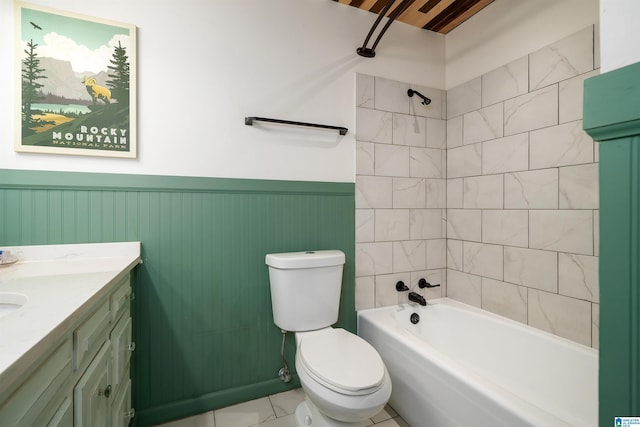 full bath featuring toilet, shower / bathtub combination, vanity, and wainscoting