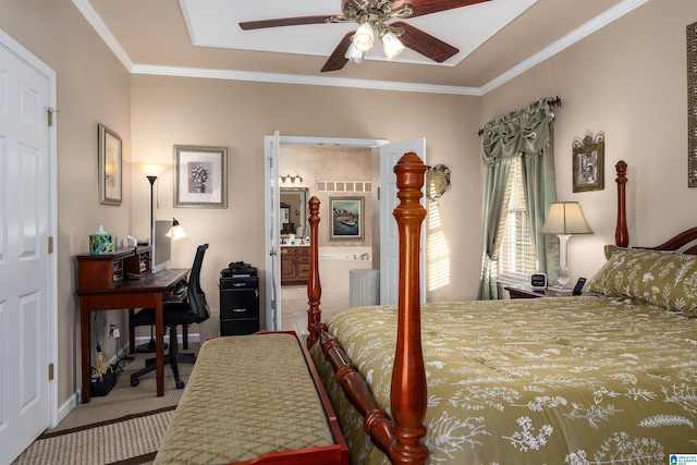 carpeted bedroom with ceiling fan, ensuite bathroom, baseboards, and ornamental molding