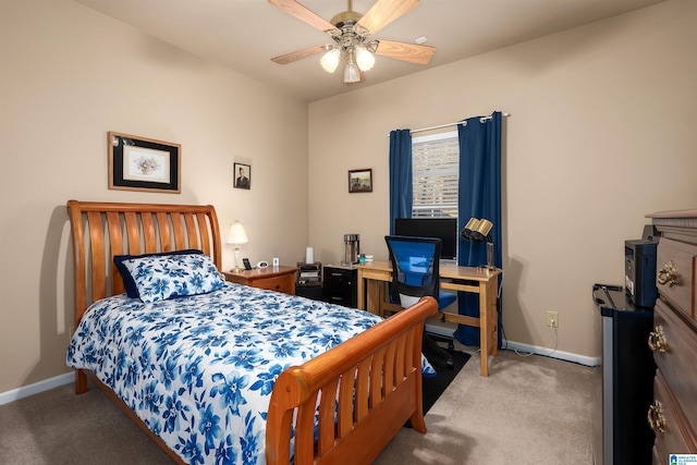 bedroom with baseboards, light carpet, and a ceiling fan